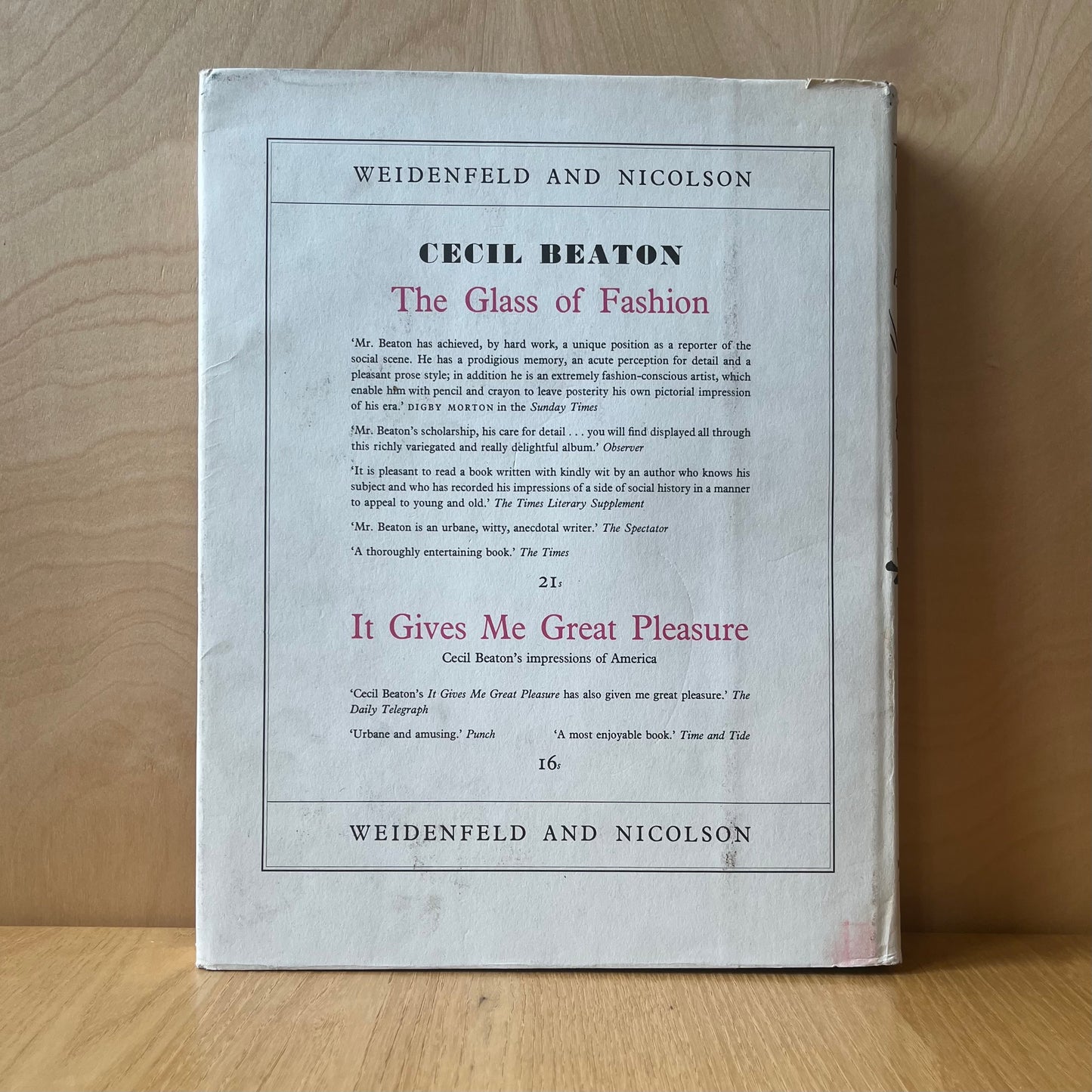 Beaton, Cecil. The Face of Another World. London: Weidenfeld & Nicolson, 1957. First edition hardcover with unclipped dust jacket in VG condition. 240 pp.