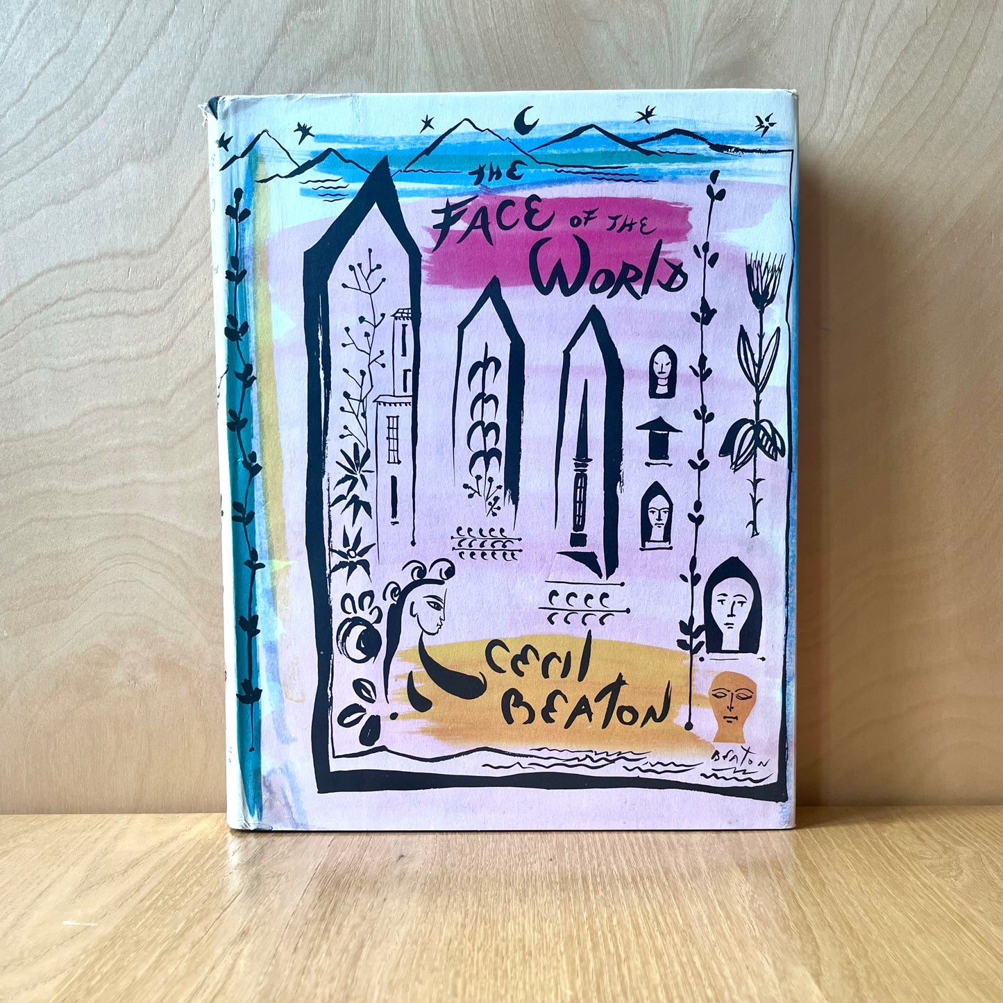 Beaton, Cecil. The Face of Another World. London: Weidenfeld & Nicolson, 1957. First edition hardcover with unclipped dust jacket in VG condition. 240 pp.