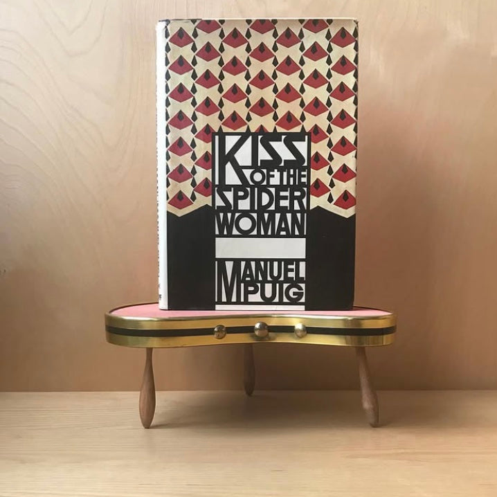 Puig, Manuel. Kiss of the Spiderwoman. Translated from the Spanish by Thomas Colchie. A. Knopf, 1979. Hardcover FIRST AMERICAN EDITION, 281 pp.